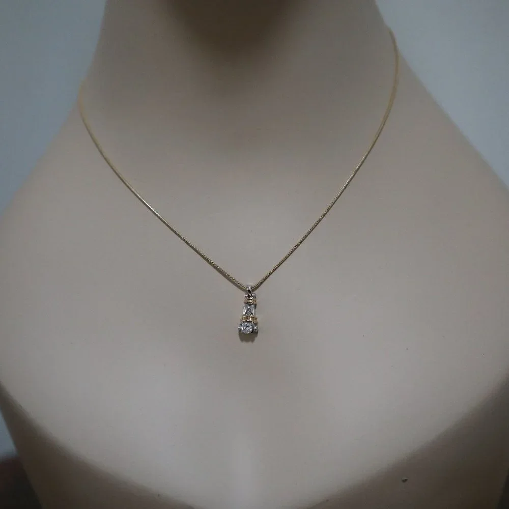 LADIES VINTAGE 14 KARAT WHITE & YELLOW GOLD BEZEL SET DIAMOND PENDANT